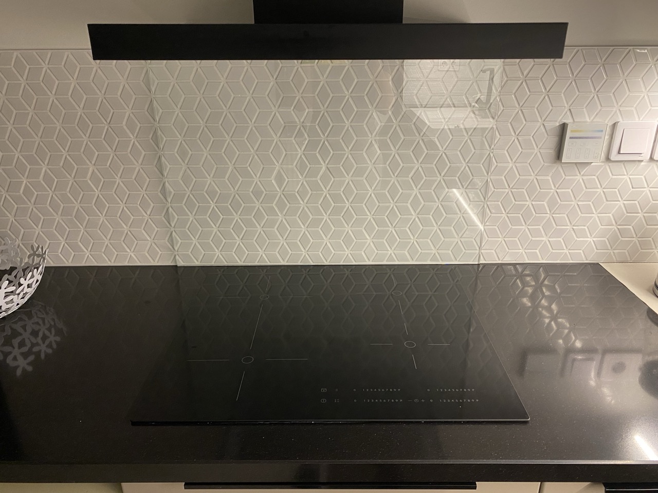 Säkerhetsglas bakom spishäll